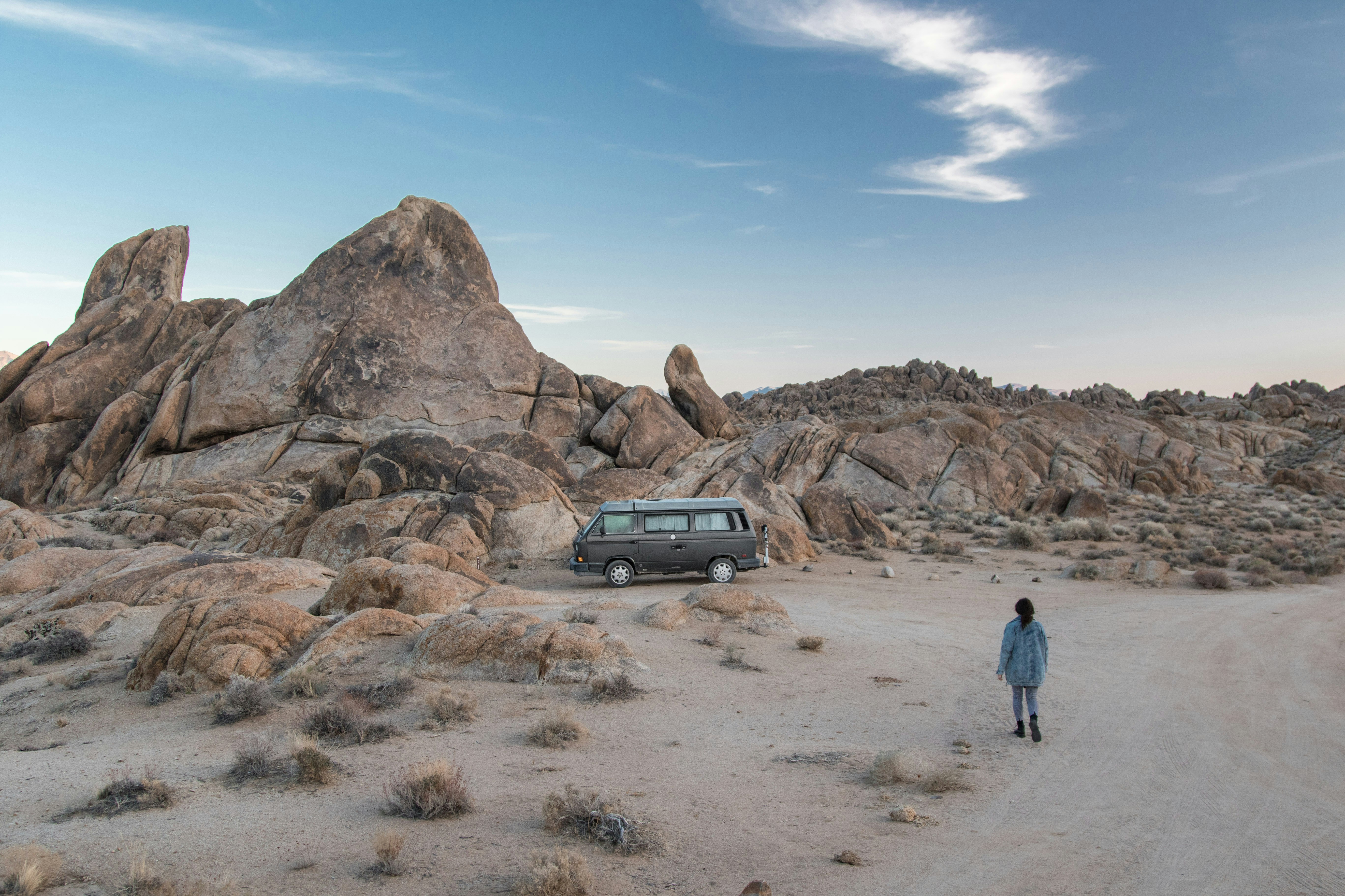 person walking on desert